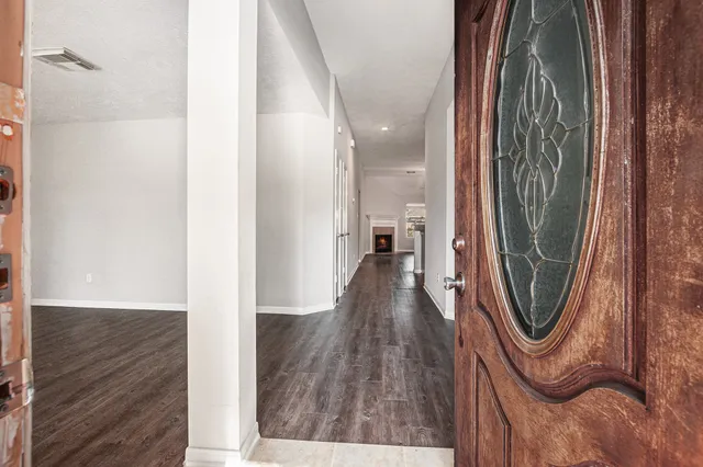 a view of a entryway with wooden floor