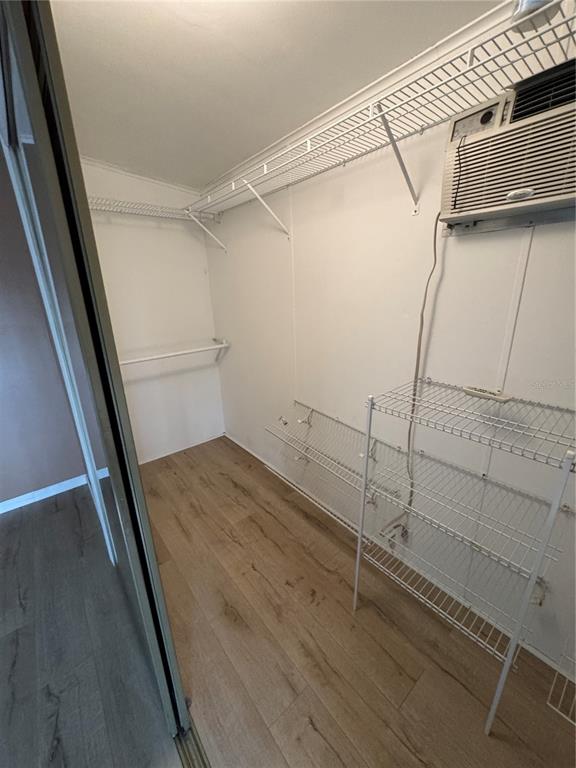 16203 Brookridge Boulevard Brooksville, FL 34613 - Photo 15 of 44 a view of a room with racks on the wall