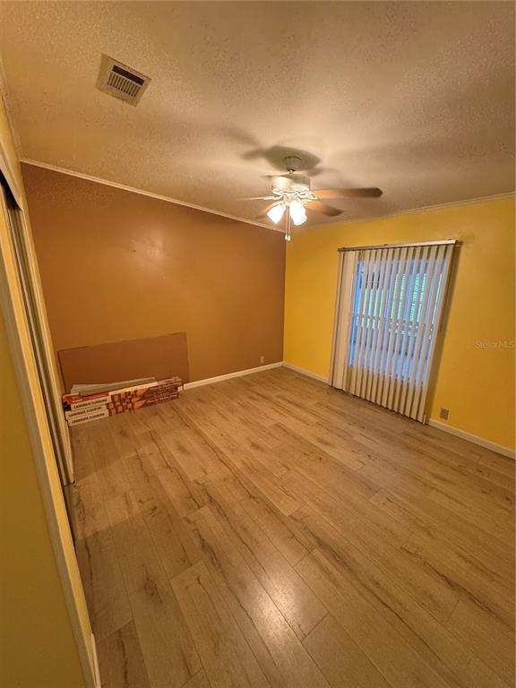 16203 Brookridge Boulevard Brooksville, FL 34613 - Photo 19 of 44 a view of a livingroom with a staircase