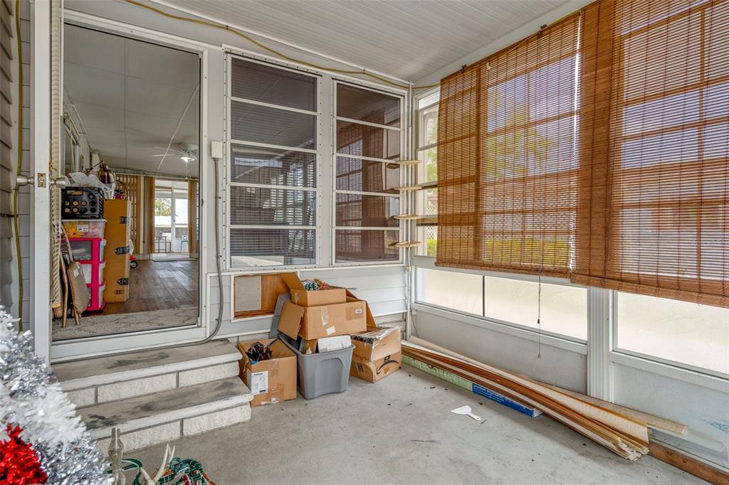 16203 Brookridge Boulevard Brooksville, FL 34613 - Photo 24 of 44 a bedroom with furniture and a window
