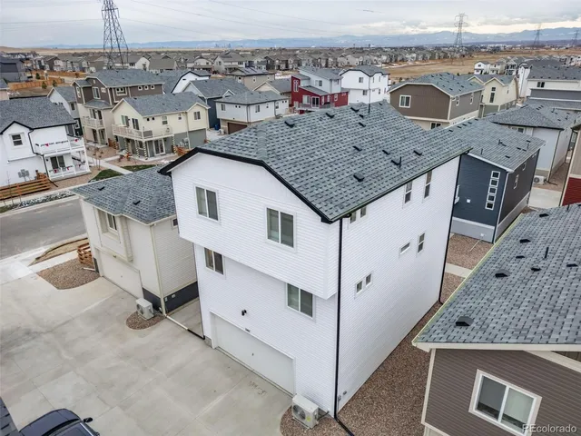 an aerial view of a house with terrace