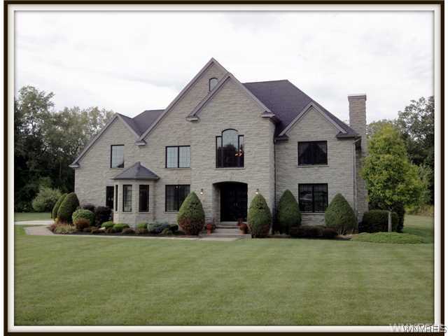 3631 Bullis Road Elma, NY 14059 - Photo 1 of 1 Exterior Front. A Stately & Traditional Stone Home