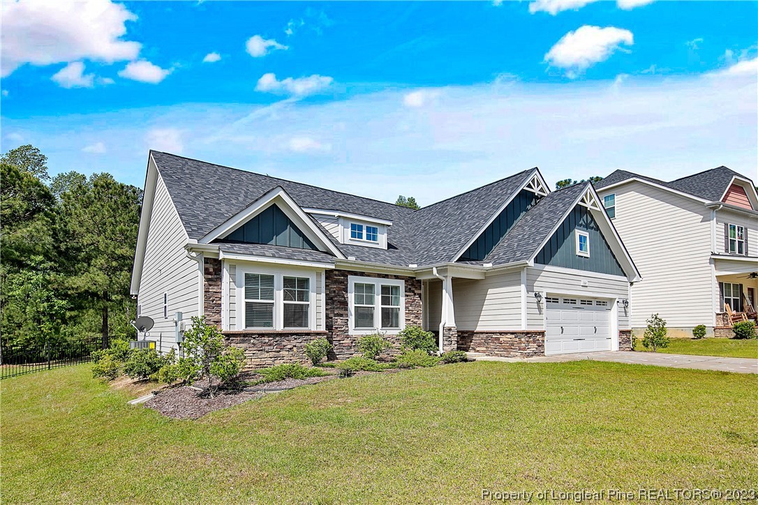 164 Valley Stream Road Spring Lake, NC 28390 - Photo 3 of 49 a view of a house with a big yard