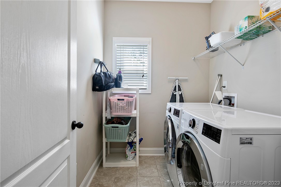 164 Valley Stream Road Spring Lake, NC 28390 - Photo 36 of 49 a utility room with dryer and washer