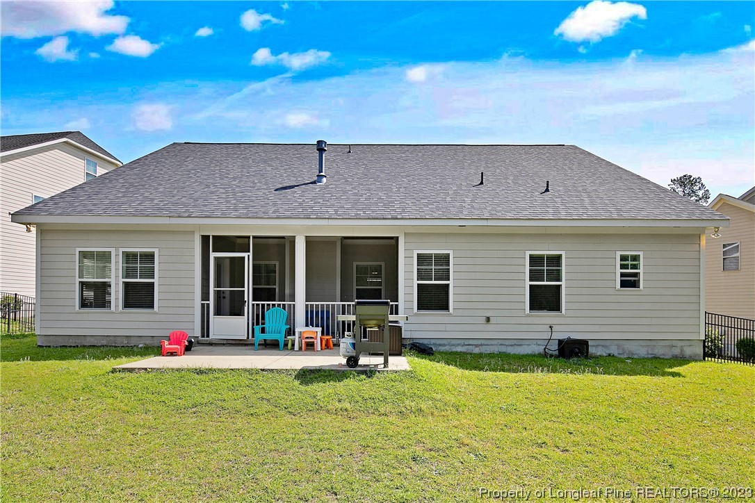 164 Valley Stream Road Spring Lake, NC 28390 - Photo 45 of 49 a backyard of a house with seating space