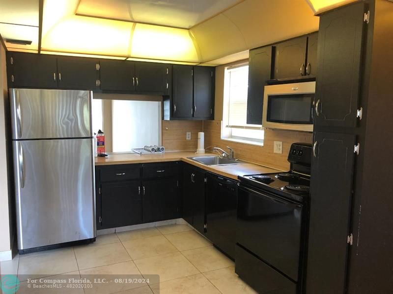 8350 Sands Point Boulevard, Unit 210E Tamarac, FL 33321 - Photo 6 of 15