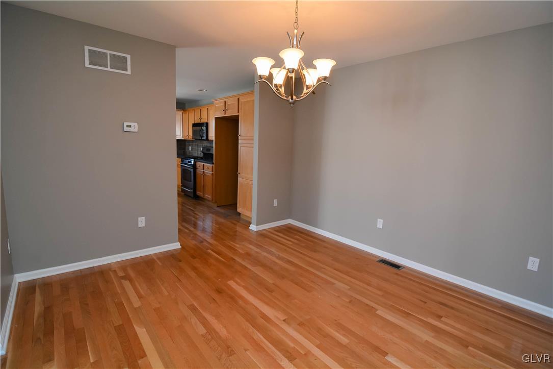4190 Ross Road Bethlehem, PA 18020 - Photo 11 of 44 a view of empty room with wooden floor