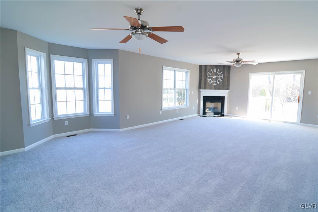4190 Ross Road Bethlehem, PA 18020 - Photo 15 of 44 a view of empty room with fireplace and windows