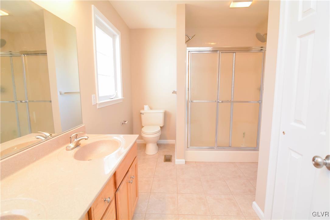 4190 Ross Road Bethlehem, PA 18020 - Photo 23 of 44 a bathroom with a sink and a mirror