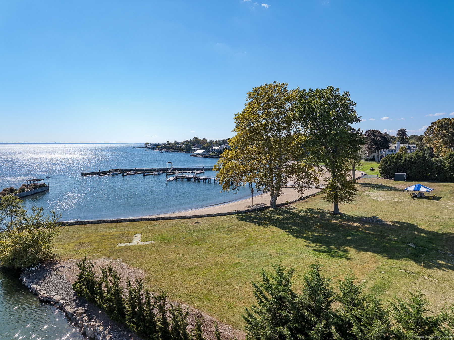 42 Signal Road Stamford, CT 06902 - Photo 9 of 15 a view of a lake with a building in the background