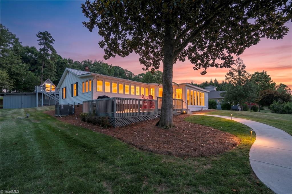 2113 Warf Road Lexington, NC 27292 - Photo 2 of 50 Home is nestled on .48 of an acre, even though it was built in the 50's, you'll be amazed at all the additons and updates since 2021.