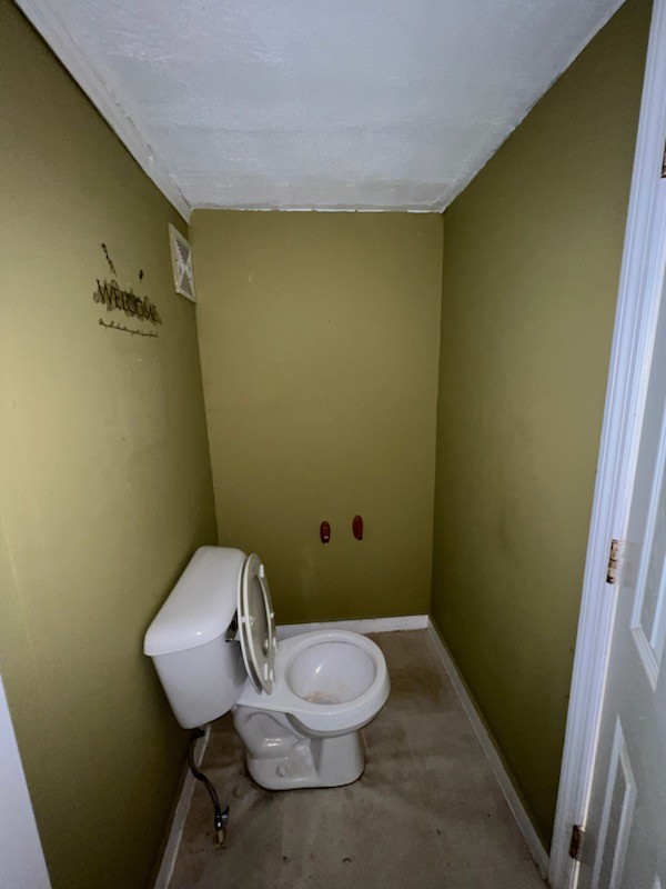 100 Park Circle Waverly, TN 37185 - Photo 29 of 32 a bathroom with a sink and a toilet
