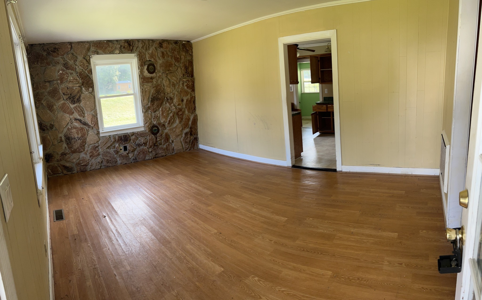 100 Park Circle Waverly, TN 37185 - Photo 6 of 32 a view of a room with wooden floor and a window
