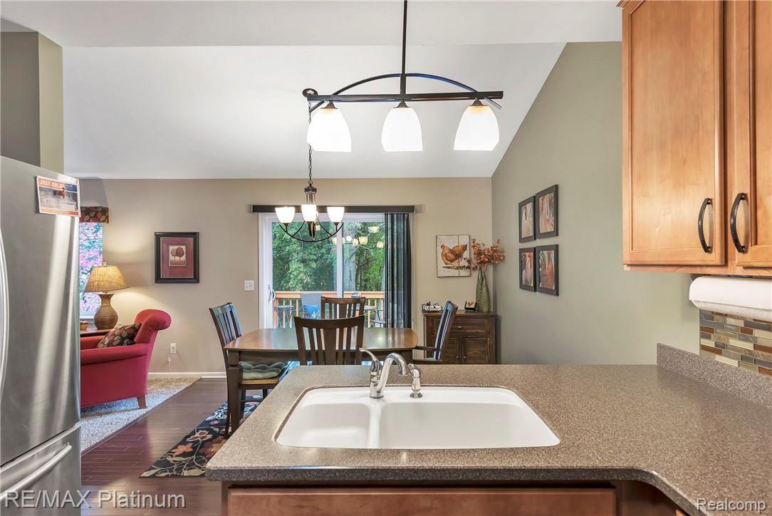 1013 Yarrow Howell, MI 48843 - Photo 12 of 35 Kitchen Overlooking Dining Area