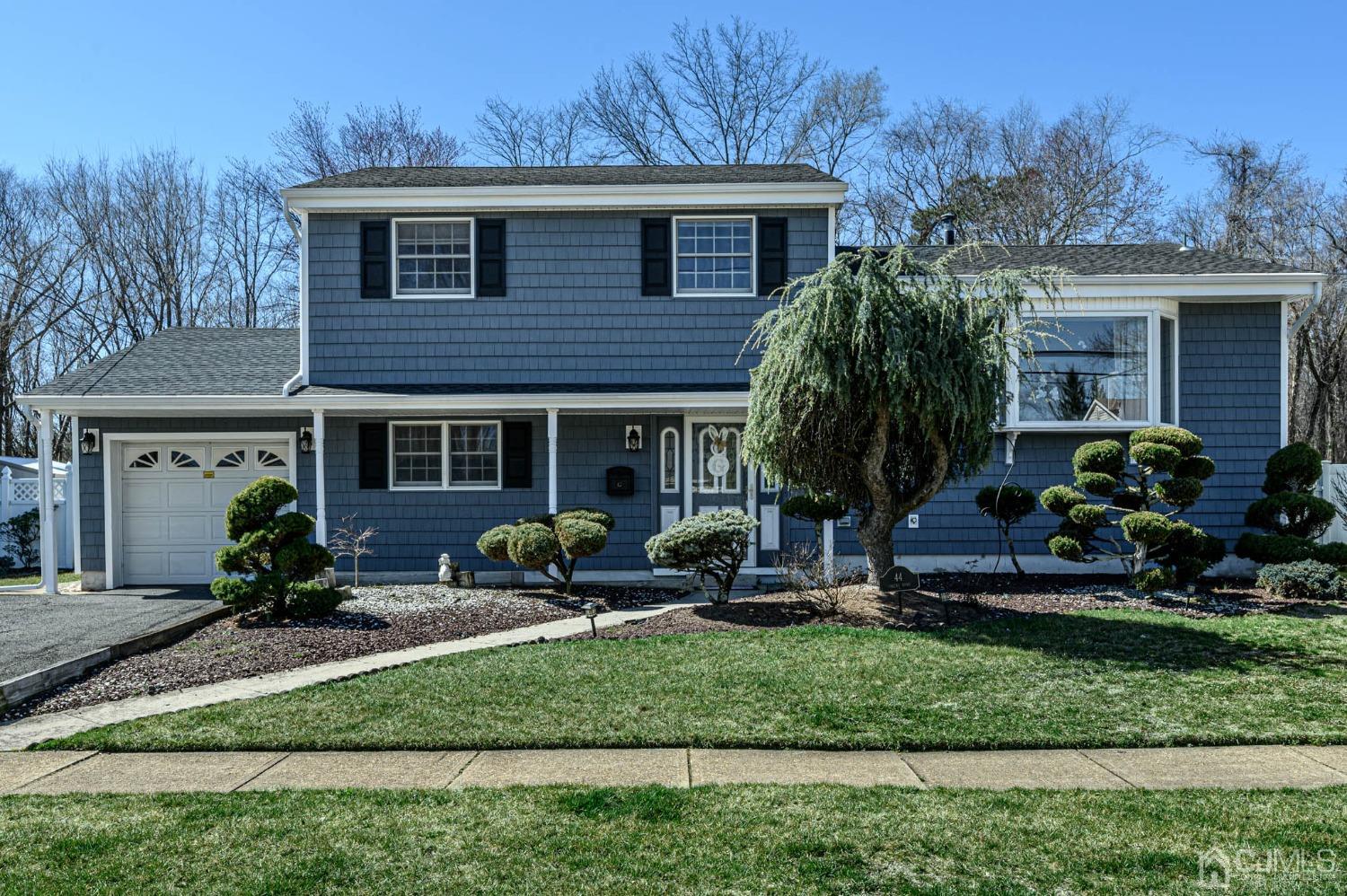 44 Owens Road Old Bridge, NJ 08857 - Photo 1 of 48 a front view of a house with garden