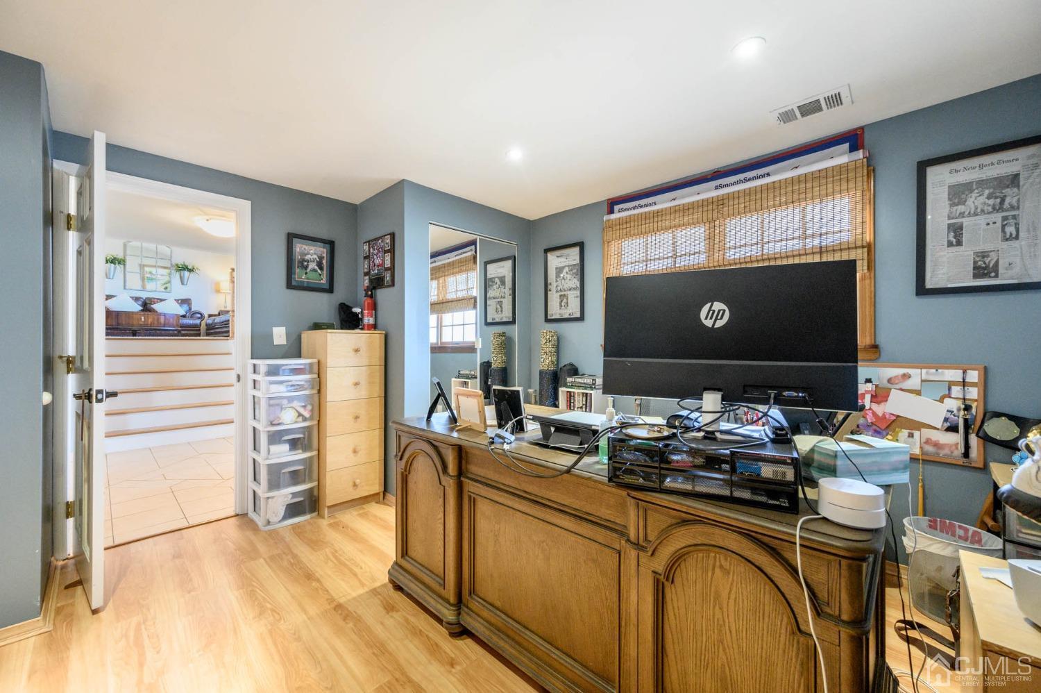 44 Owens Road Old Bridge, NJ 08857 - Photo 11 of 48 a room with wooden floor and furniture