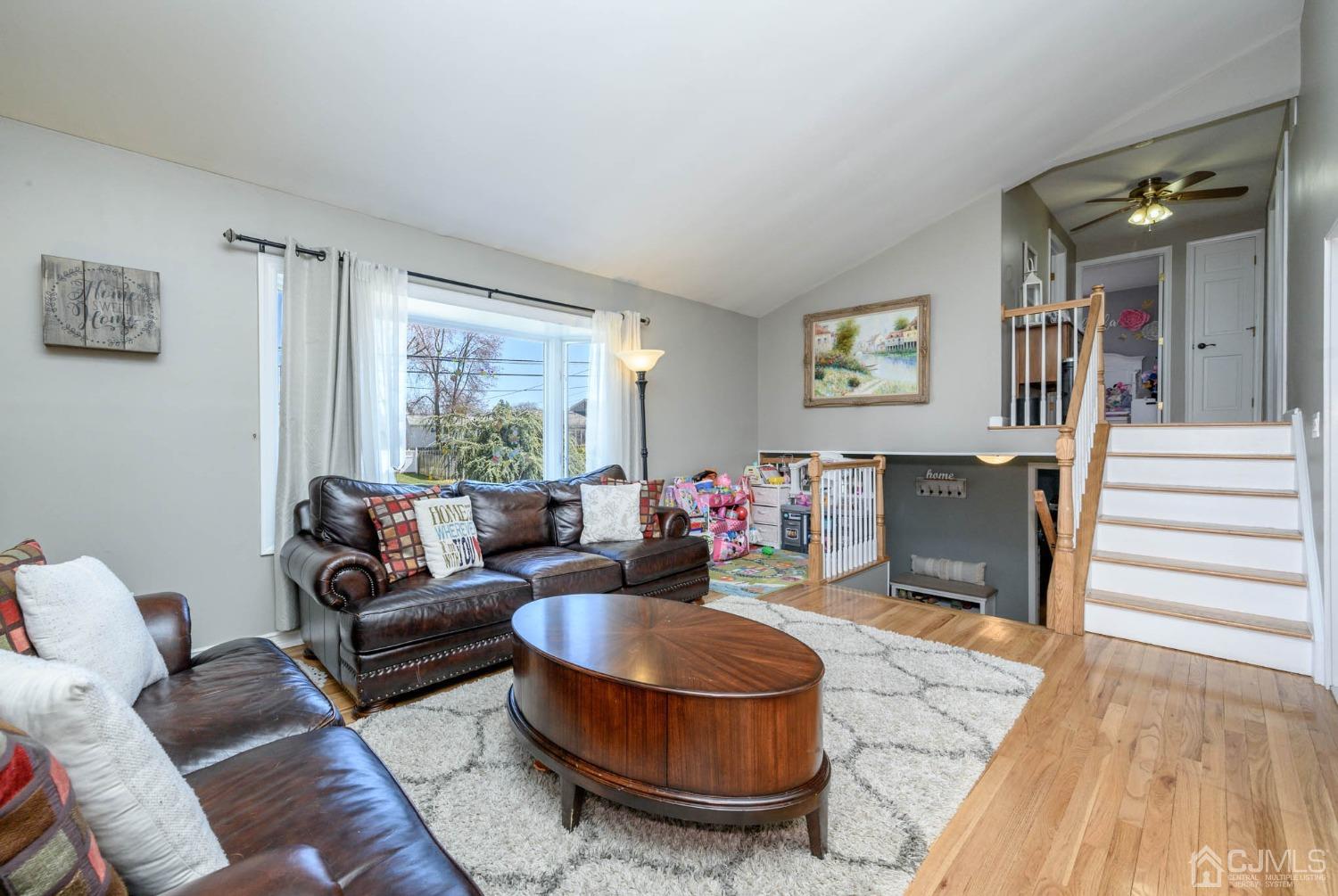 44 Owens Road Old Bridge, NJ 08857 - Photo 13 of 48 a living room with furniture and a large window