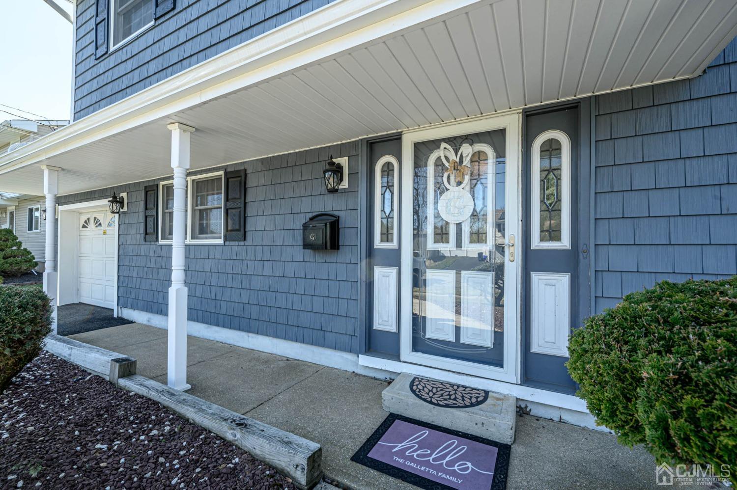 44 Owens Road Old Bridge, NJ 08857 - Photo 2 of 48 a front view of a house with a glass door