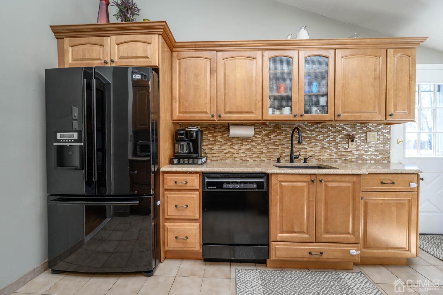 44 Owens Road Old Bridge, NJ 08857 - Photo 21 of 48 a kitchen with stainless steel appliances granite countertop a refrigerator and a sink