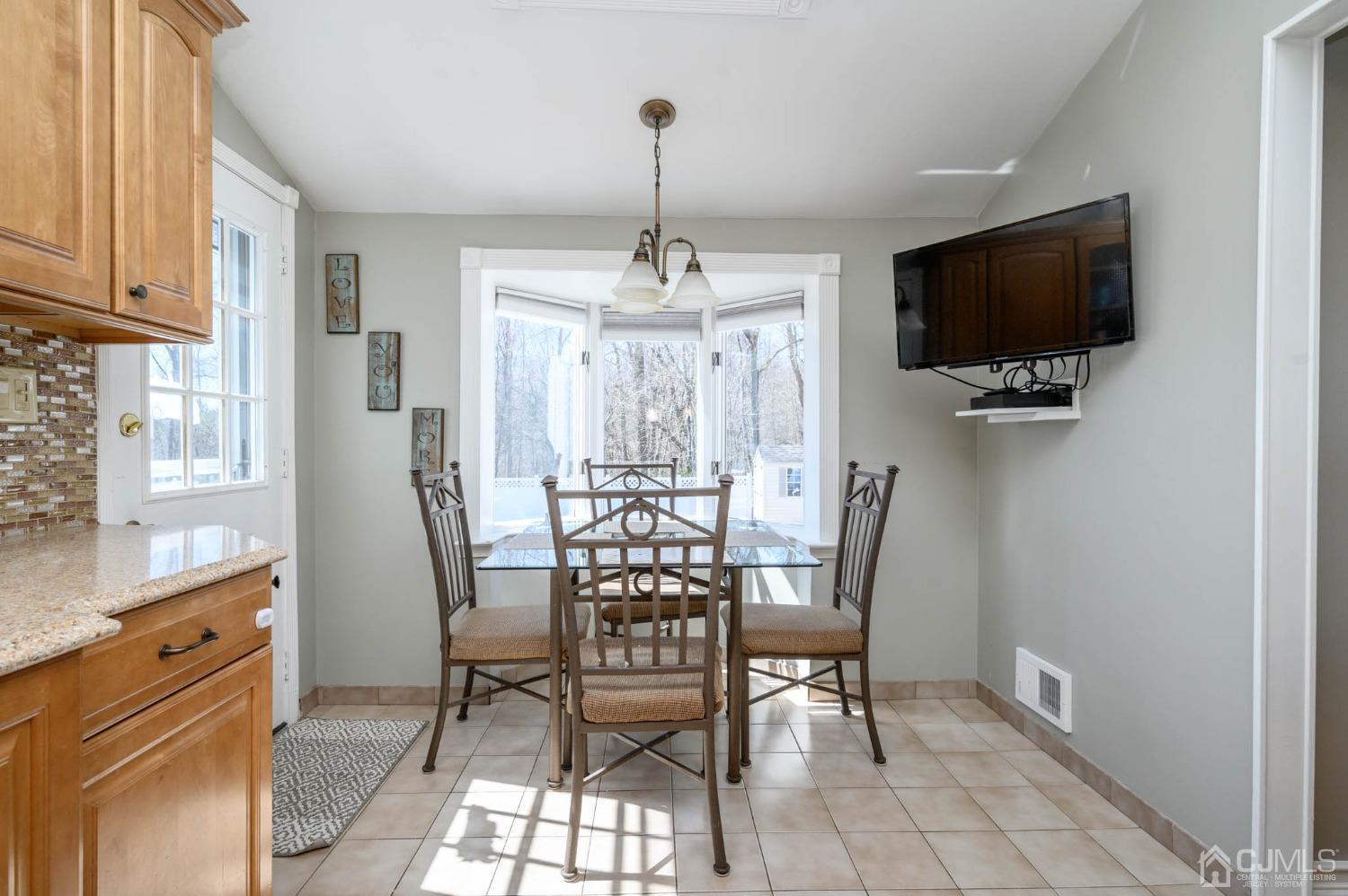 44 Owens Road Old Bridge, NJ 08857 - Photo 23 of 48 a view of a dining room with furniture window and wooden floor