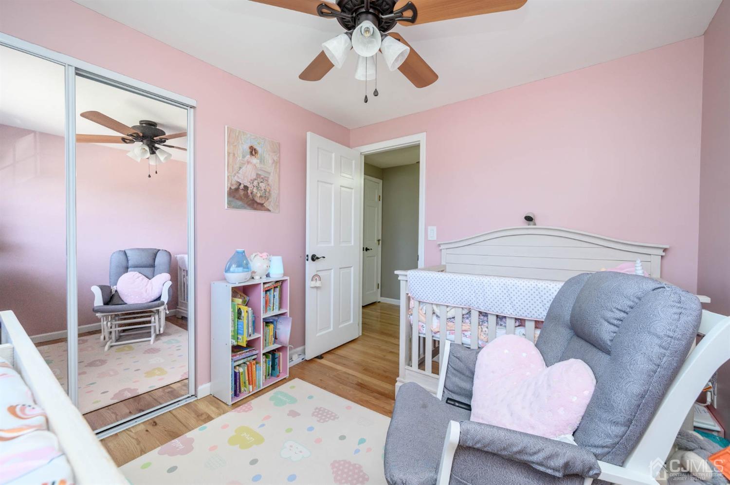 44 Owens Road Old Bridge, NJ 08857 - Photo 28 of 48 a living room with furniture and a chandelier