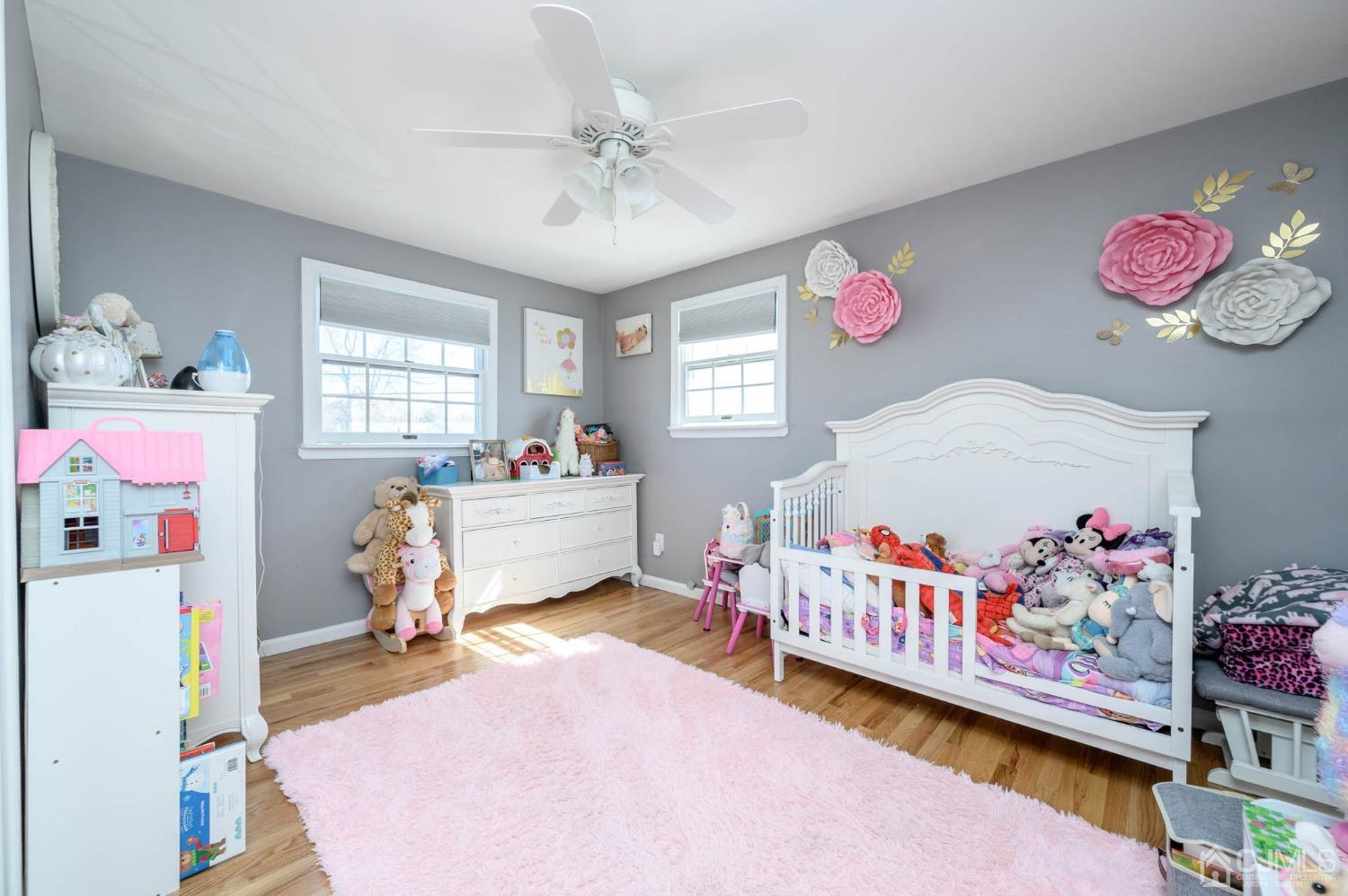 44 Owens Road Old Bridge, NJ 08857 - Photo 30 of 48 a bedroom with furniture a chandelier and a couch