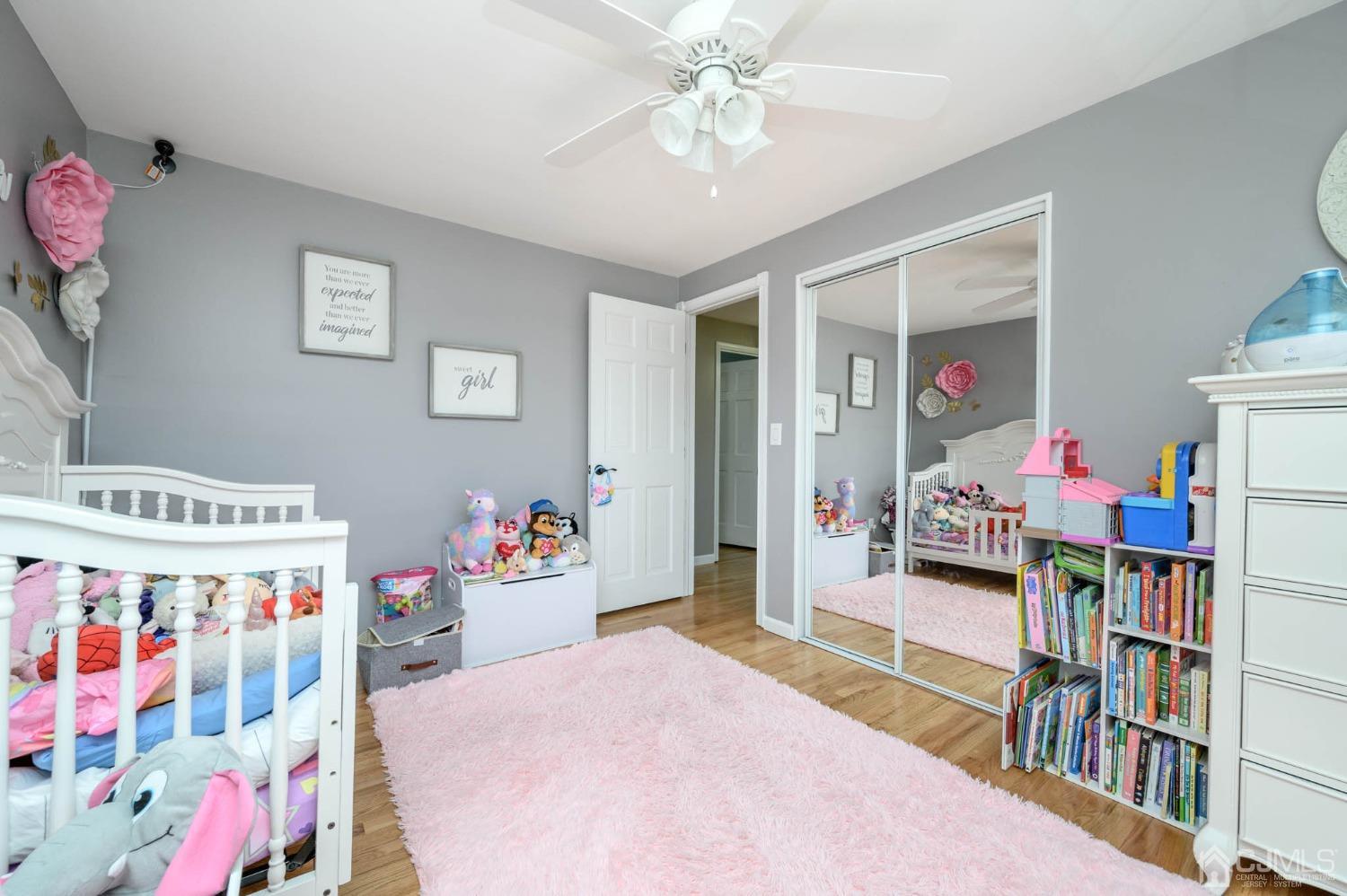 44 Owens Road Old Bridge, NJ 08857 - Photo 31 of 48 a bedroom with furniture and a book shelf