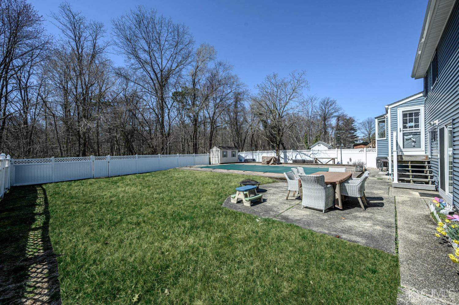 44 Owens Road Old Bridge, NJ 08857 - Photo 33 of 48 a view of a park with bench and trees