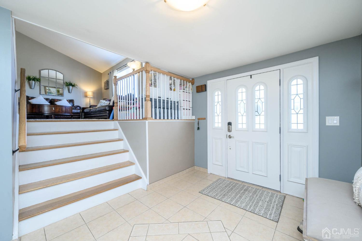 44 Owens Road Old Bridge, NJ 08857 - Photo 4 of 48 a view of a bedroom with furniture and staircase