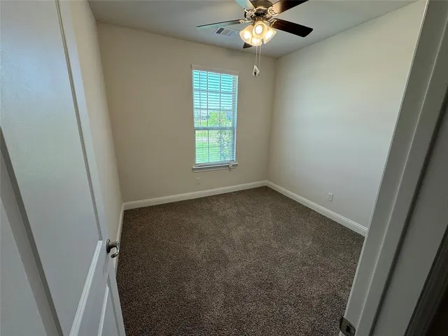 a view of a livingroom with a window