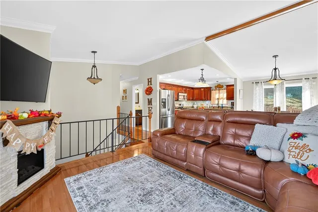 a bathroom with a sink vanity mirror and toilet