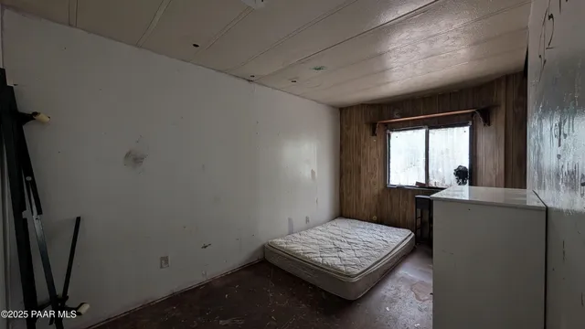 a room with furniture and window