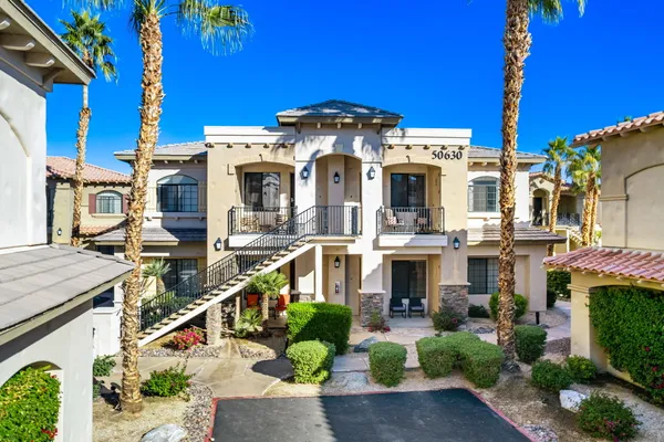 a front view of a house with a city view