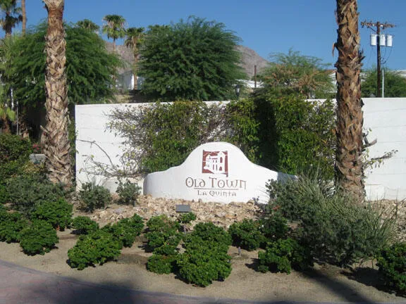 a sign board with a sign of a park
