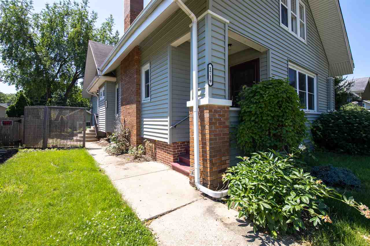 1719 Post Avenue Rockford, IL 61103 - Photo 2 of 29 a view of a chair and table in backyard of house