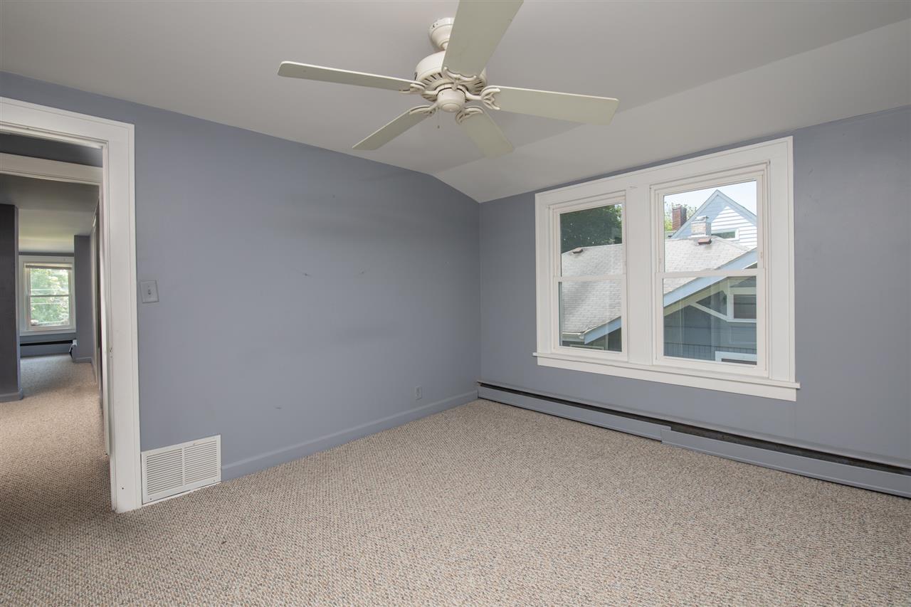 1719 Post Avenue Rockford, IL 61103 - Photo 24 of 29 an empty room with windows and fan