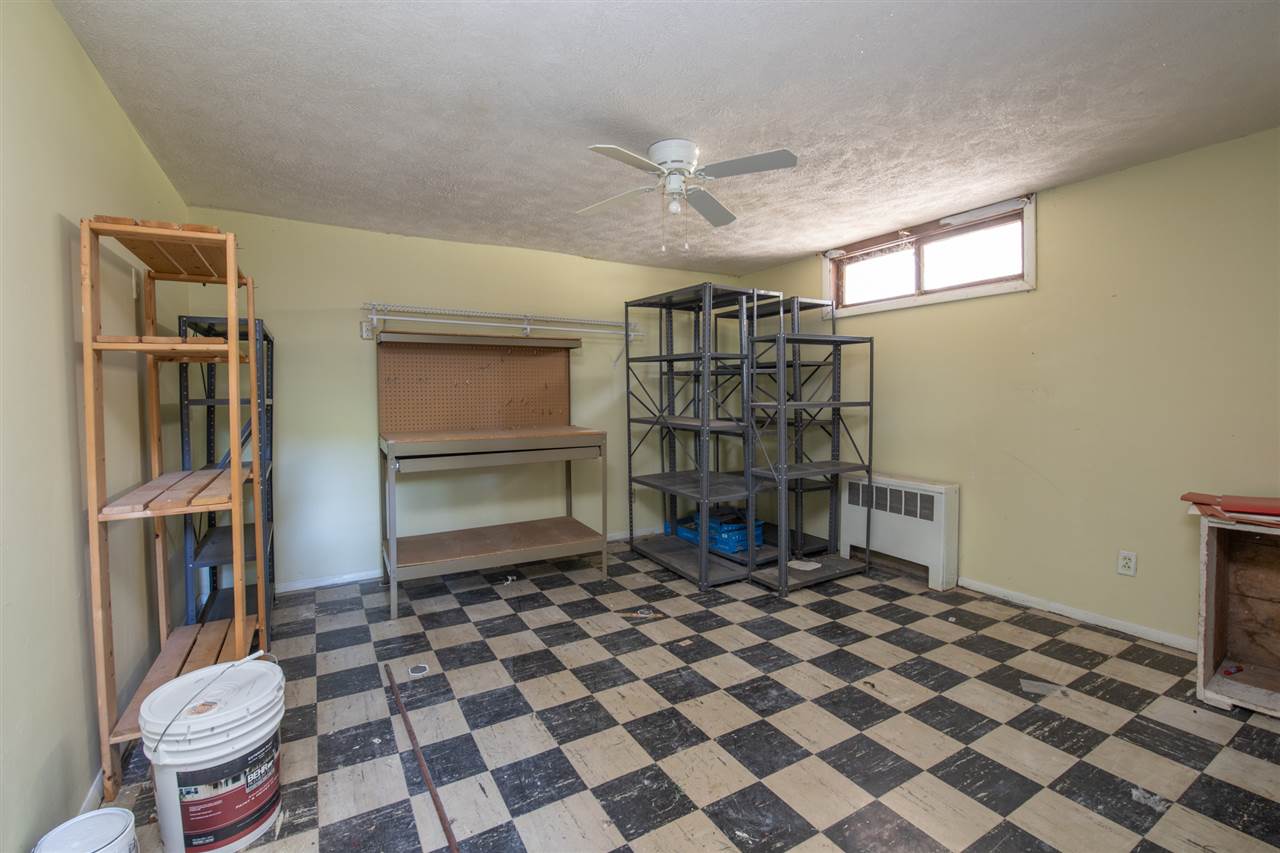 1719 Post Avenue Rockford, IL 61103 - Photo 25 of 29 a room with furniture and a fireplace