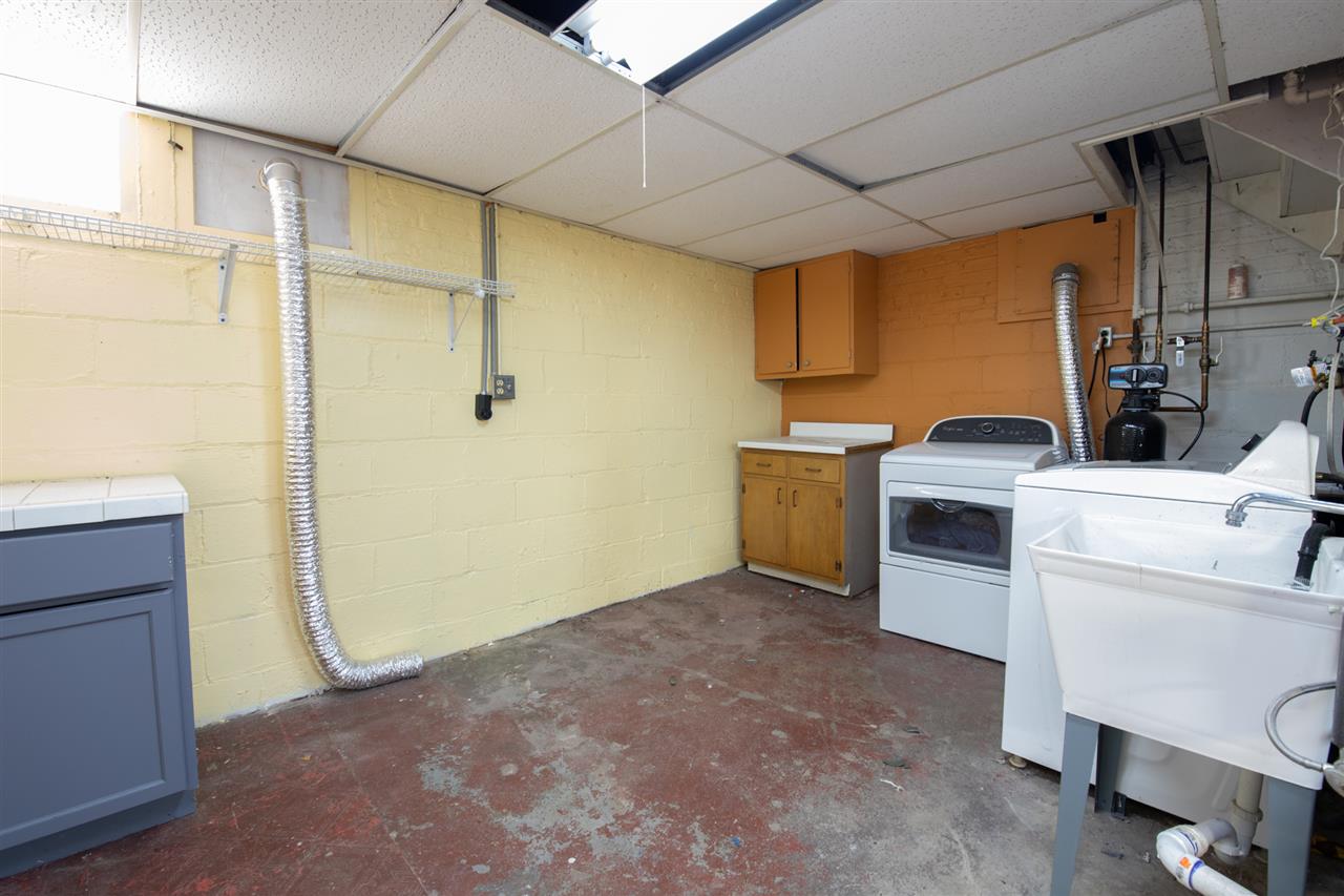 1719 Post Avenue Rockford, IL 61103 - Photo 27 of 29 a view of a storage & utility room with dryer and washer
