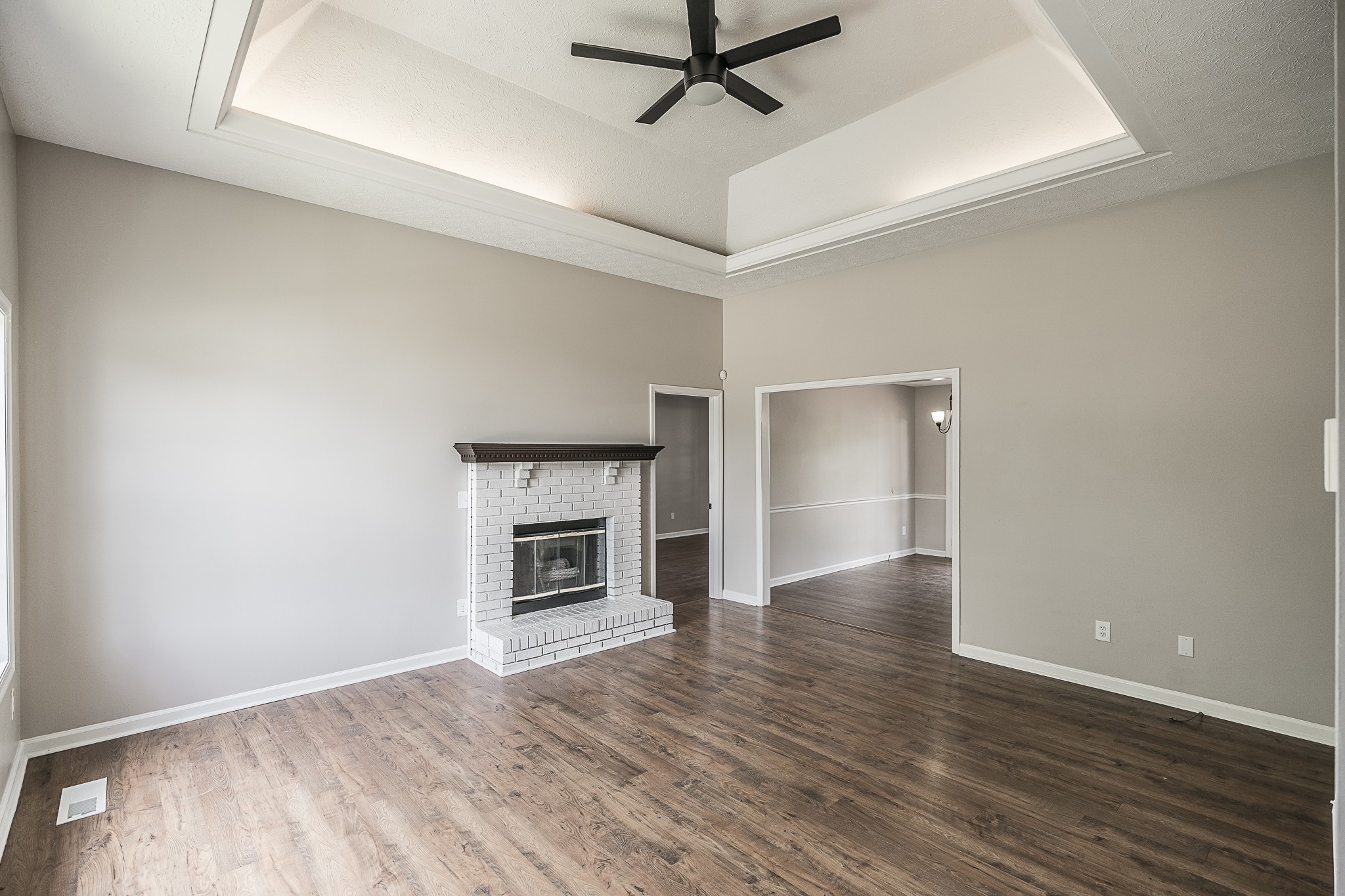 467 Calista Road White House, TN 37188 - Photo 4 of 33 Living room with gas fireplace and lighted trey ceiling