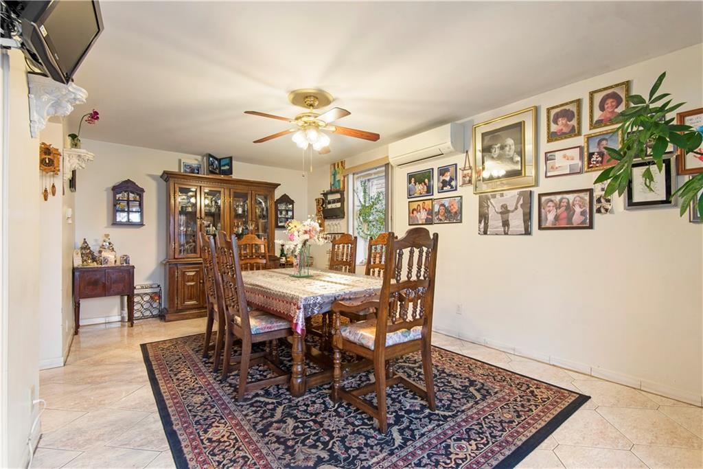 8745 17th Avenue Brooklyn, NY 11214 - Photo 8 of 31 a view of a dining room with furniture