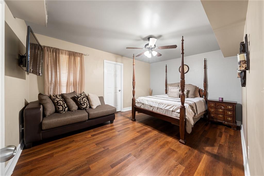 55 Meridian Point Dallas, GA 30132 - Photo 29 of 45 a bedroom with a bed couch and window