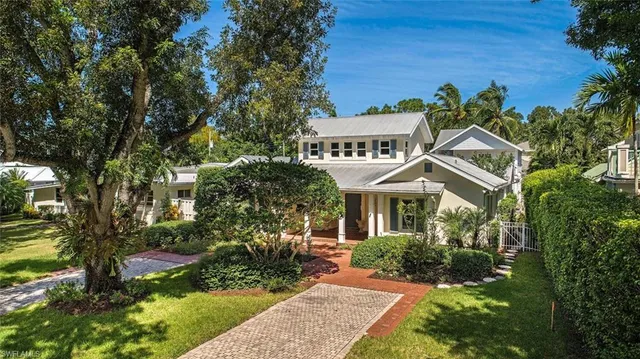 a view of a house with a garden
