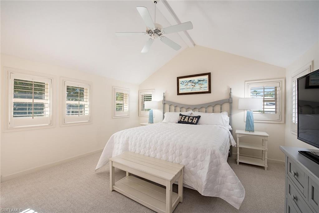 369 2nd Avenue North Naples, FL 34102 - Photo 16 of 25 a bed room with a bed and a tv