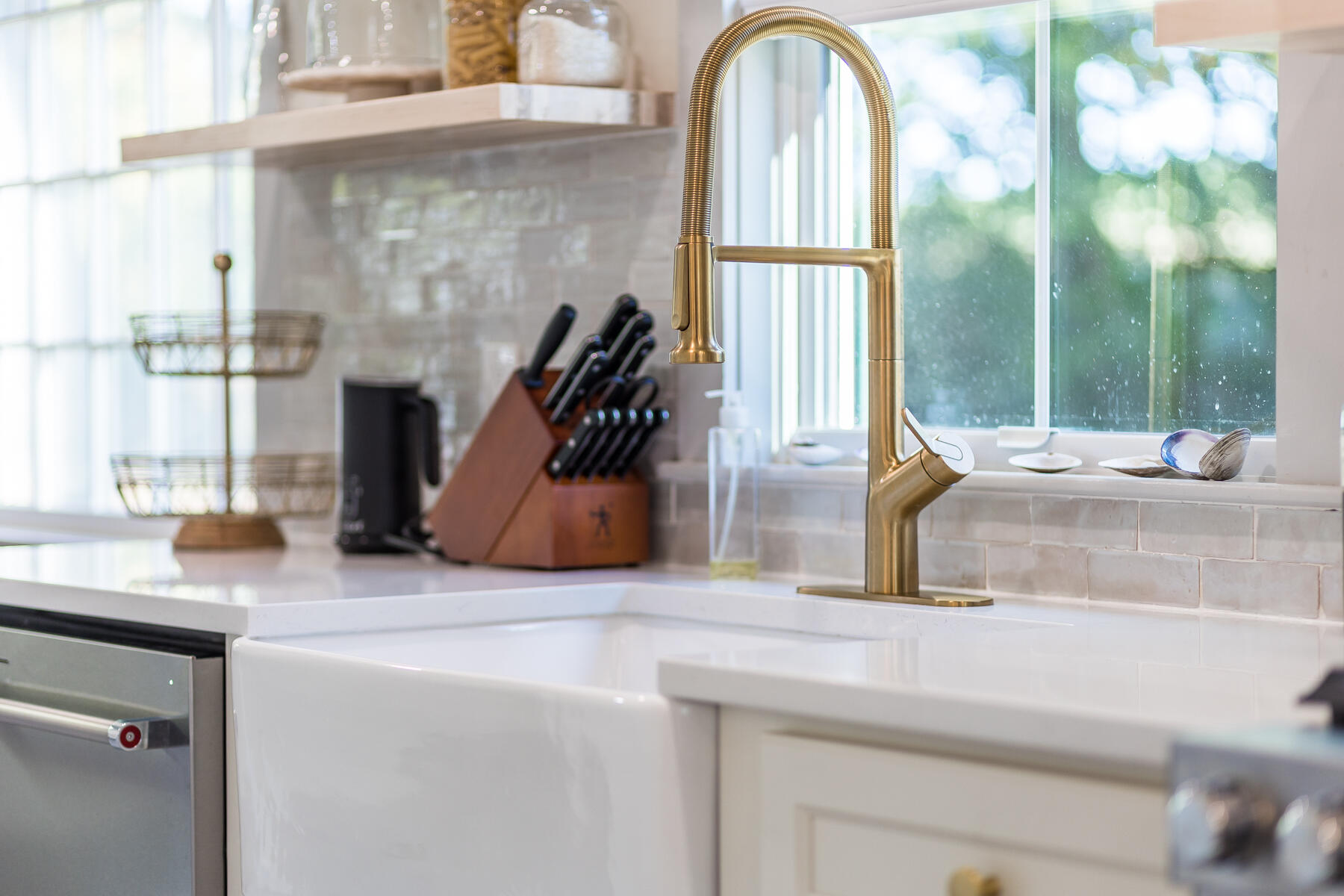 3 High Street Falmouth, MA 02543 - Photo 13 of 52 a kitchen with a sink and a window