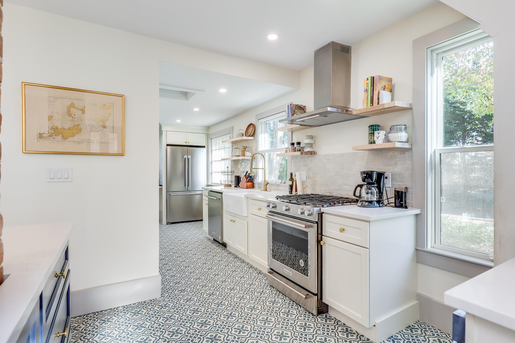 3 High Street Falmouth, MA 02543 - Photo 14 of 52 a kitchen with stainless steel appliances granite countertop a stove a sink and a refrigerator