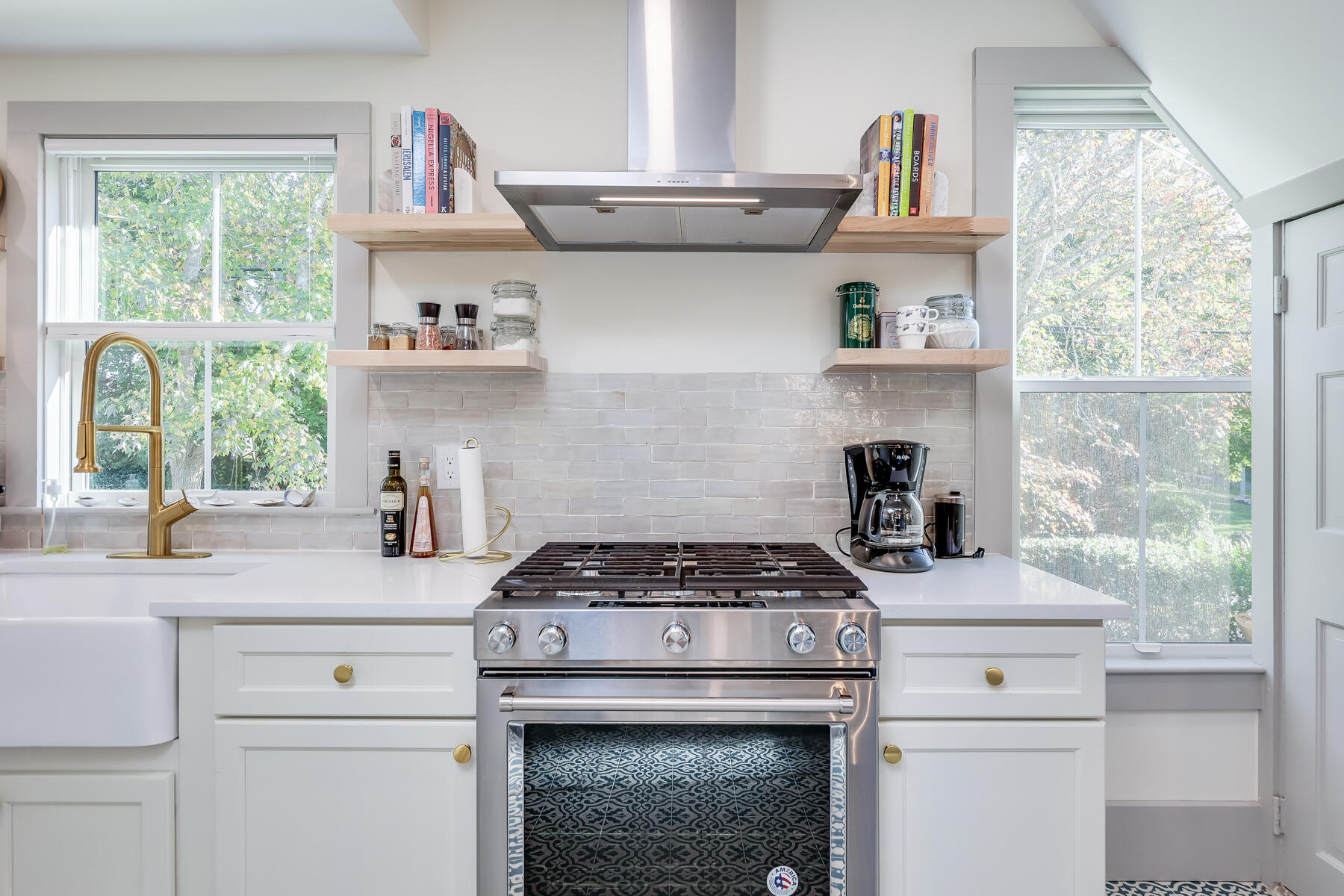 3 High Street Falmouth, MA 02543 - Photo 16 of 52 a kitchen with a stove and a sink