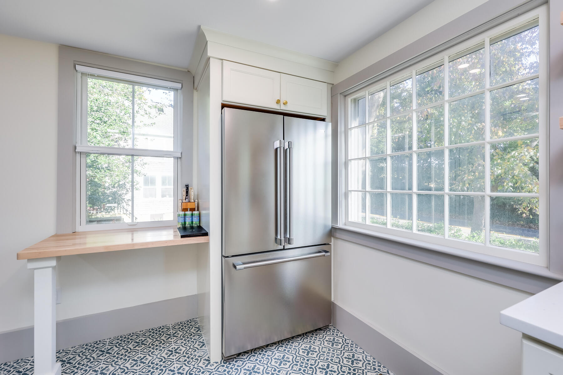 3 High Street Falmouth, MA 02543 - Photo 21 of 52 a view of a kitchen with a refrigerator and window