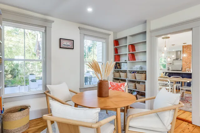 a spacious bedroom with a large bed and a window