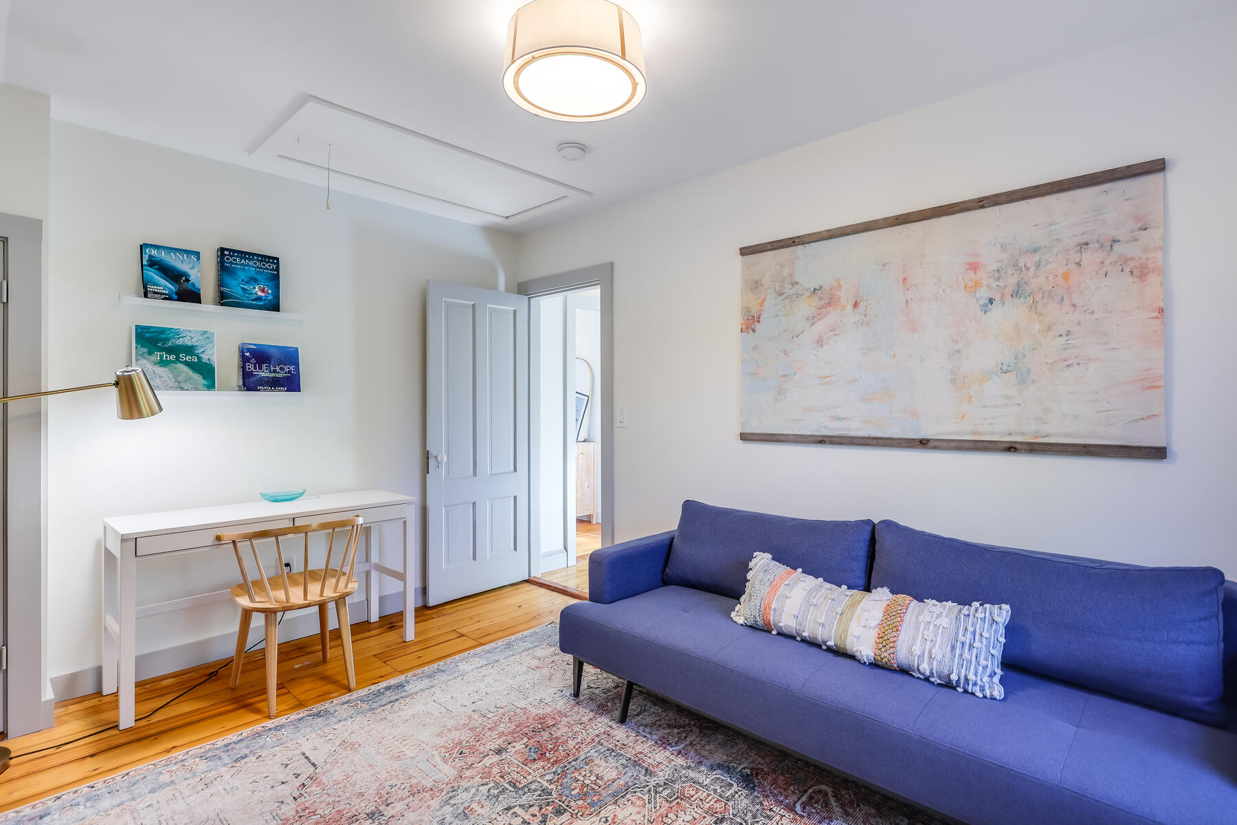 3 High Street Falmouth, MA 02543 - Photo 38 of 52 a living room with furniture and a window