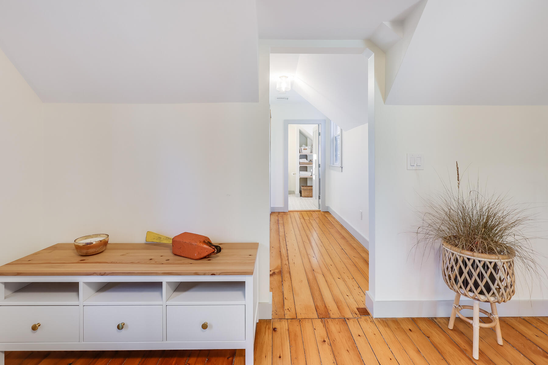 3 High Street Falmouth, MA 02543 - Photo 39 of 52 a view of room with cabinets and potted plant